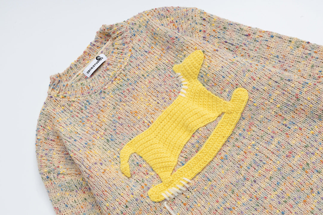 Speckled Knit Sweater With Crochet Rocking Horse Patch