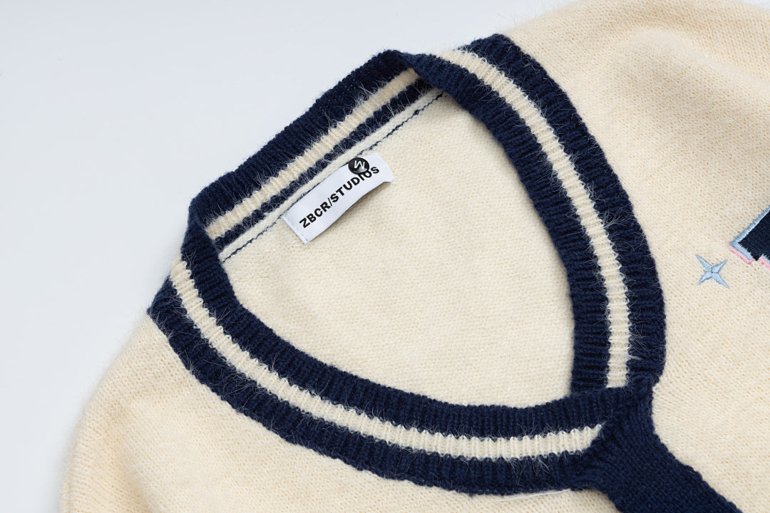 Fuzzy Varsity V‑Neck Sweater With Knit Tie & R Logo